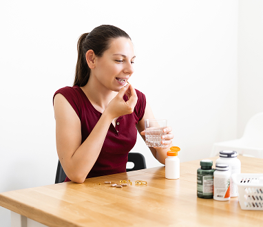 Woman Taking Medicines Woman Taking Medicines